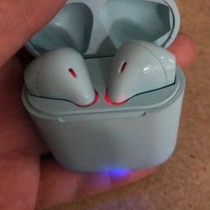 Baby blue AirPods in good condition